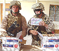 Marines in Iraq opening Care Packages