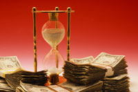 hourglass and money