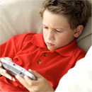 Boy playing videogame