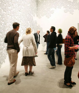 Visitors viewing works by Tara Donovan