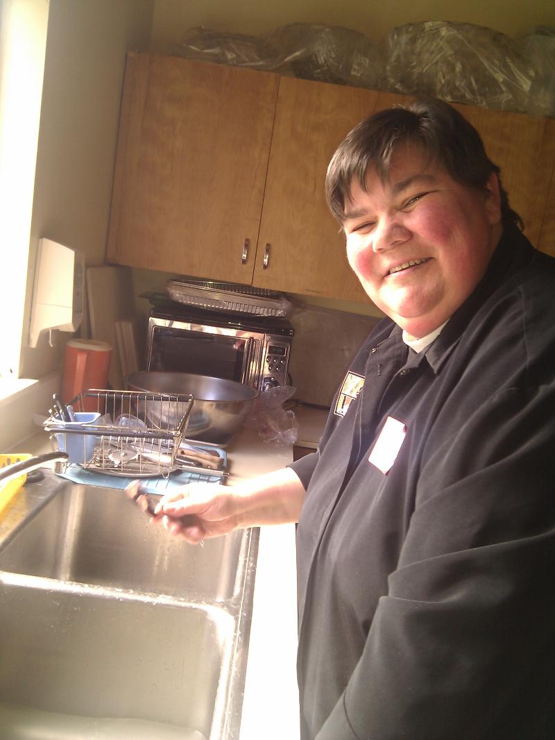 Sheila washing dishes