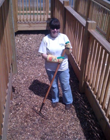 Melanie working on mulch