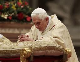 Pope Benedict praying