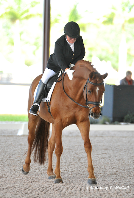 Ellie Brimmer (USA) Grade III and London Swing celebrating their ride. Photo by Lindsay McCall