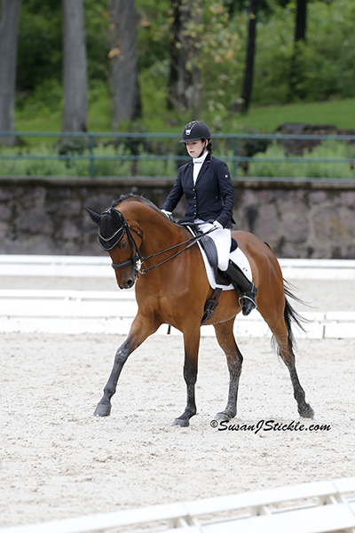 Angela Peavy and Ozzy Cooper (Trak), owned by Rebecca Reno (Grade III). Photo copyright SusanJStickle.com. Photo is taken in Gladstone, NJ at  the 2014 USEF Para-Equestrian Dressage National Championship/ Selection Trial for the Alltech FEI World Equestrian Games™ (WEG).