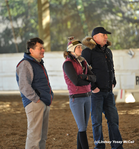 Collaborative Coaching: (Left to Right) Clive Milkins, Annie Sweet, and Dennis Callin work together while instructing Annie Sweet's Para-Dressage rider, Lara Oles. Sweet, Milkins, And Callin worked together and discussed how to use specific training techniques. Photo by Lindsay Y McCall